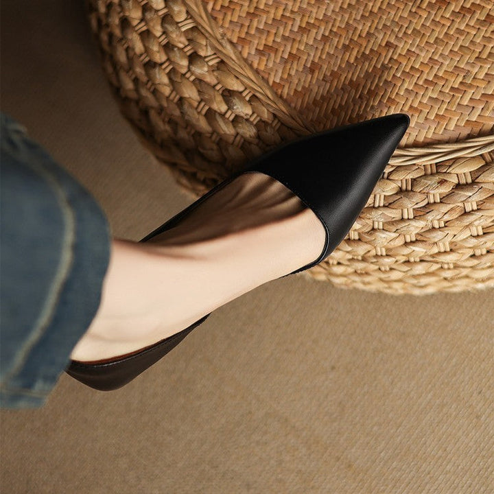 Women's pointed leather kitten heel pumps, front view
