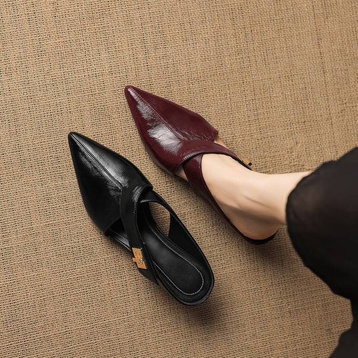 Pointed leather heeled mules styled with cropped trousers