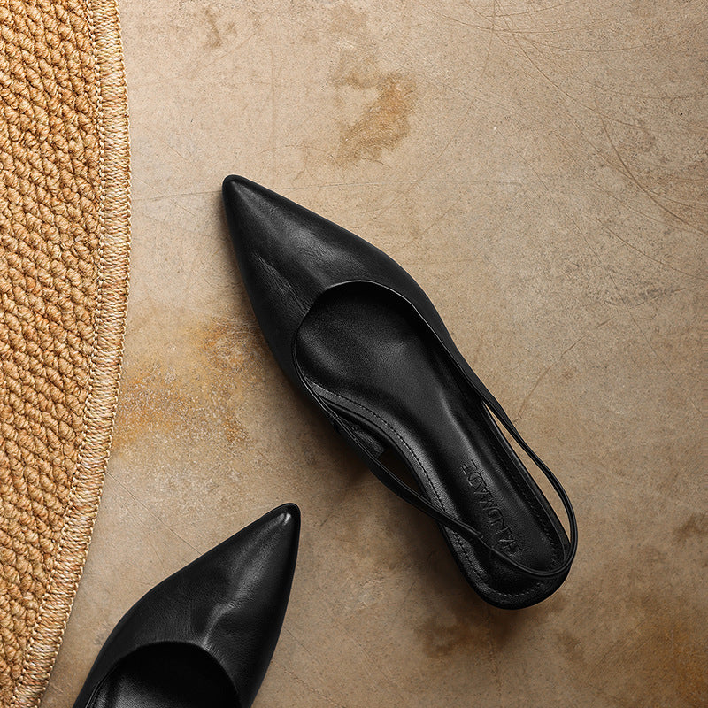 Sculpted block-heel detail on a leather slingback