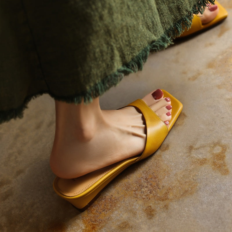 Ivory Cream leather wedge mule, side view of 1.5-inch wedge