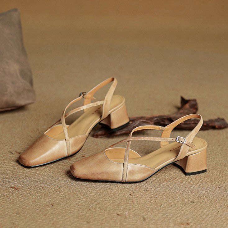 Square-toe leather slingbacks styled with cropped trousers