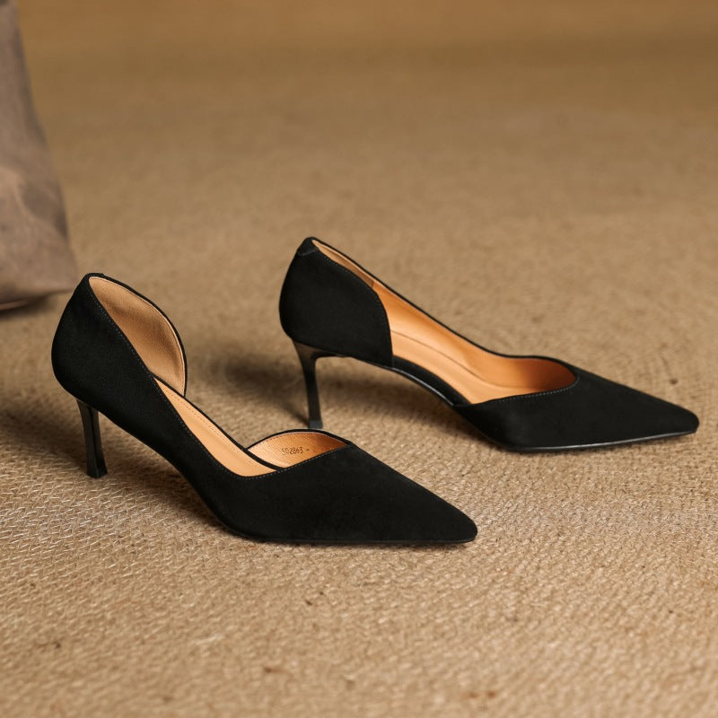 Pointed leather d'Orsay pumps, top view of Midnight Black pair