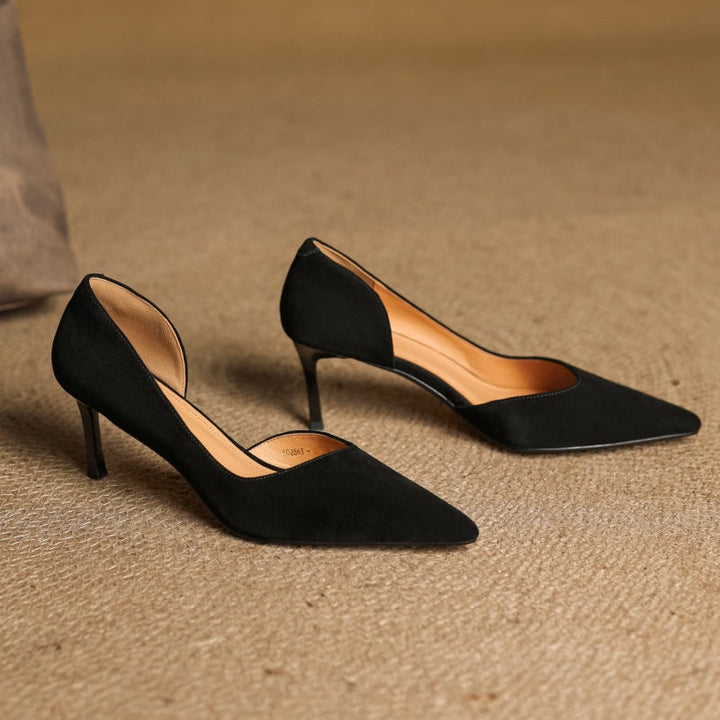 Pointed leather d'Orsay pumps, top view of Midnight Black pair