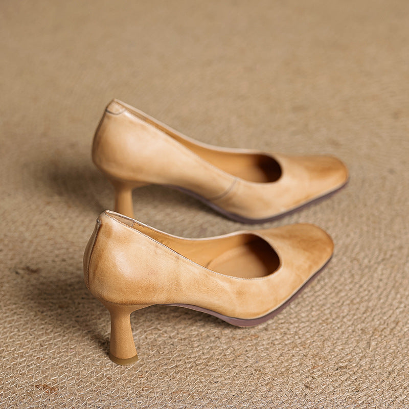 Square-toe leather pumps, top view of Sandstone Beige pair