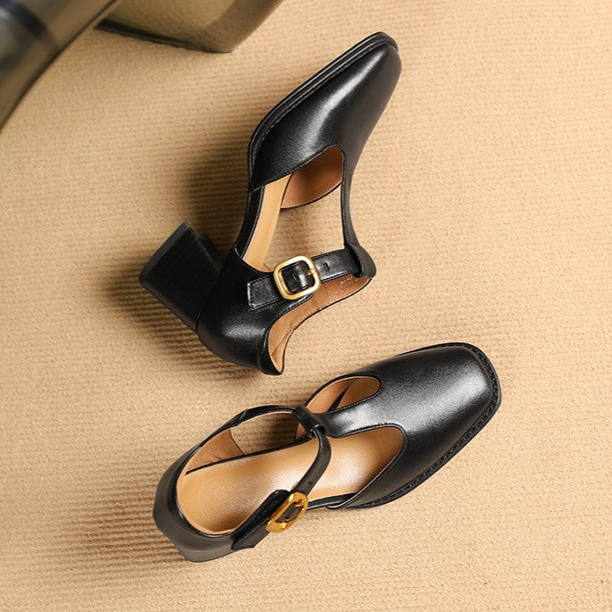 Square-toe T-strap leather pumps, top view of Onyx Noir pair