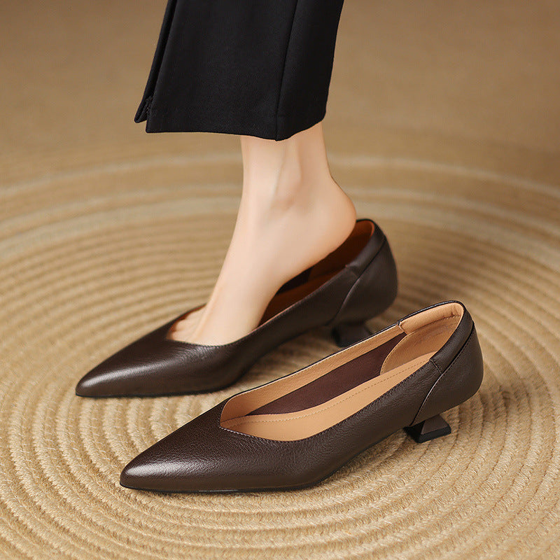 Sculpted leather pumps styled with denim