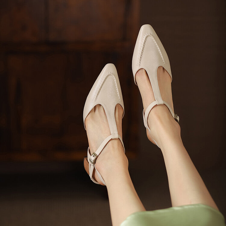 Close-up of block heel on Paulette leather T-strap heels