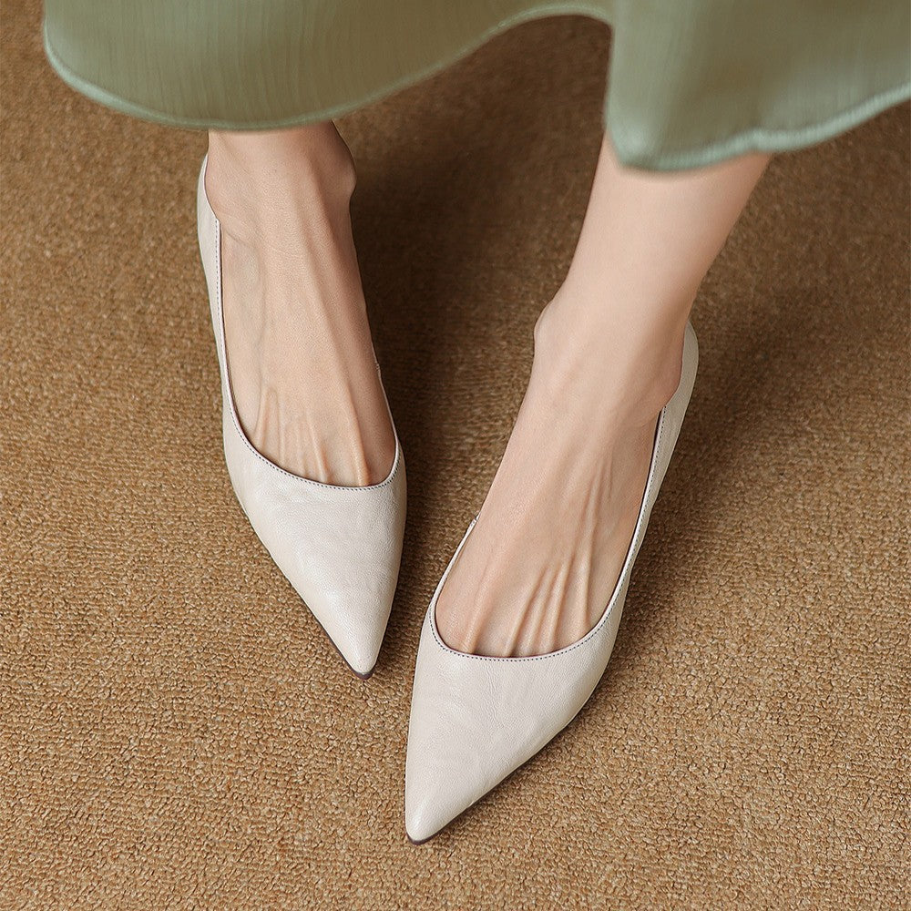 Noir Black Paloma pumps photographed from above