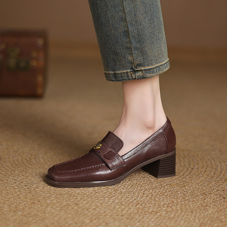 Cocoa Brown lambskin loafer pump with floral accent, three-quarter view