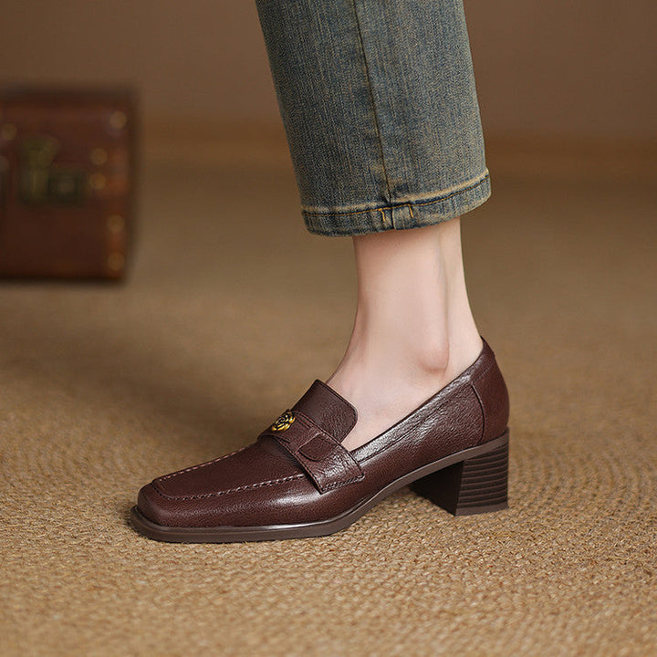 Cocoa Brown lambskin loafer pump with floral accent, three-quarter view