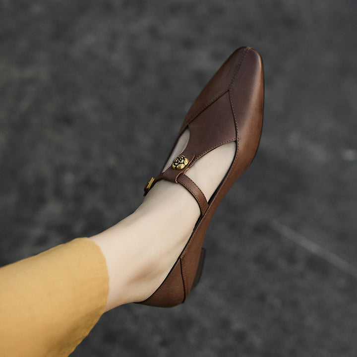 Corinne pumps, close-up of floral buckle detail