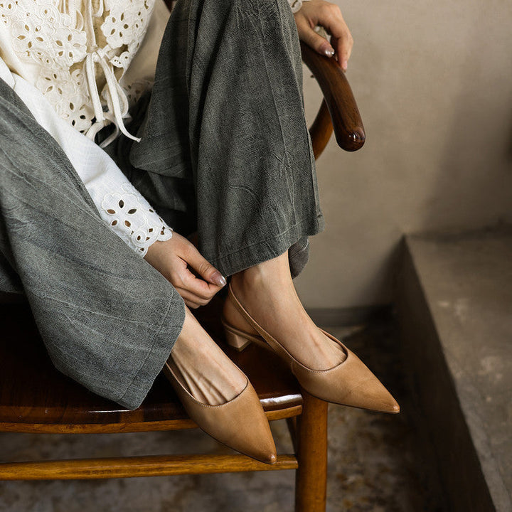 Close-up of softly washed leather on a pointed slingback