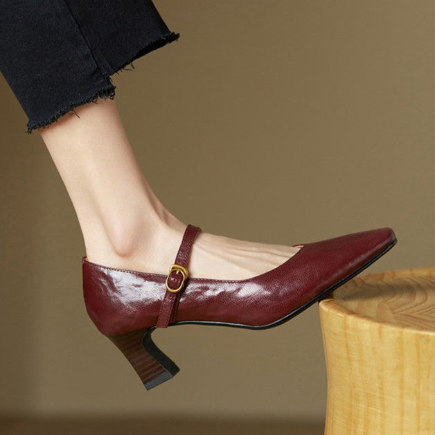 Close-up of block heel on Patrice leather pumps