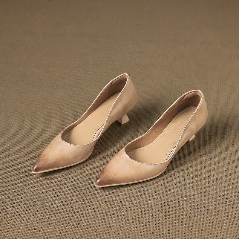 Pointed leather kitten heel, angled heel view
