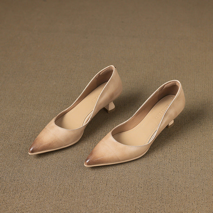 Pointed leather kitten heel, angled heel view