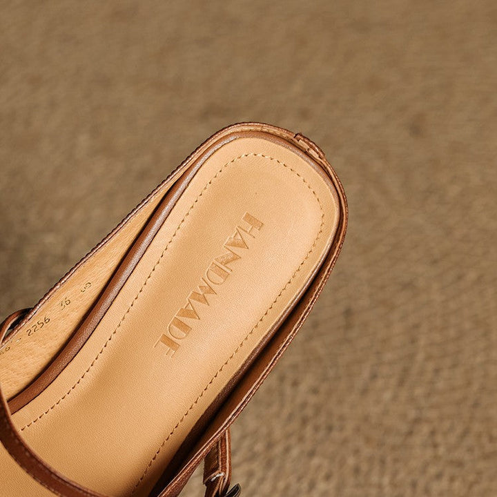 Close-up of block heel on Cecilia leather mules