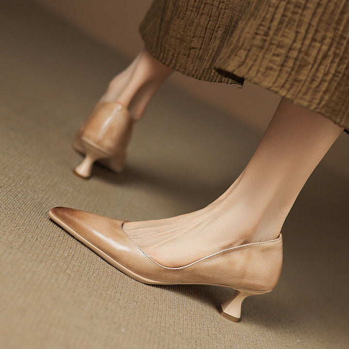 Pointed-toe kitten heel pump, back view showing the 2-inch heel