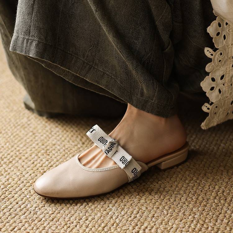 Burgundy Wine leather bow mules, angled studio shot