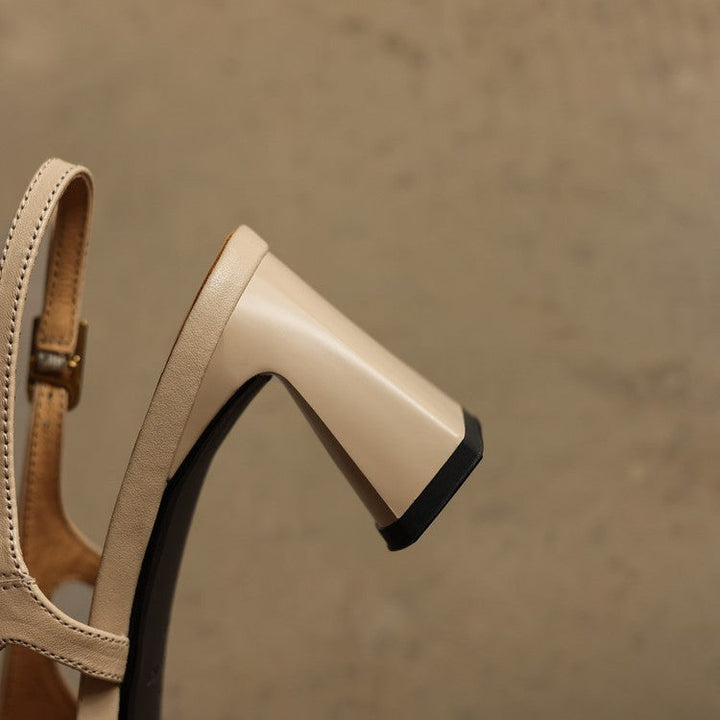 Noir Black leather slingback heels, angled studio shot