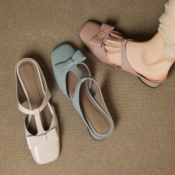 Bow T-bar leather heeled mules, top view of Rose Blush pair