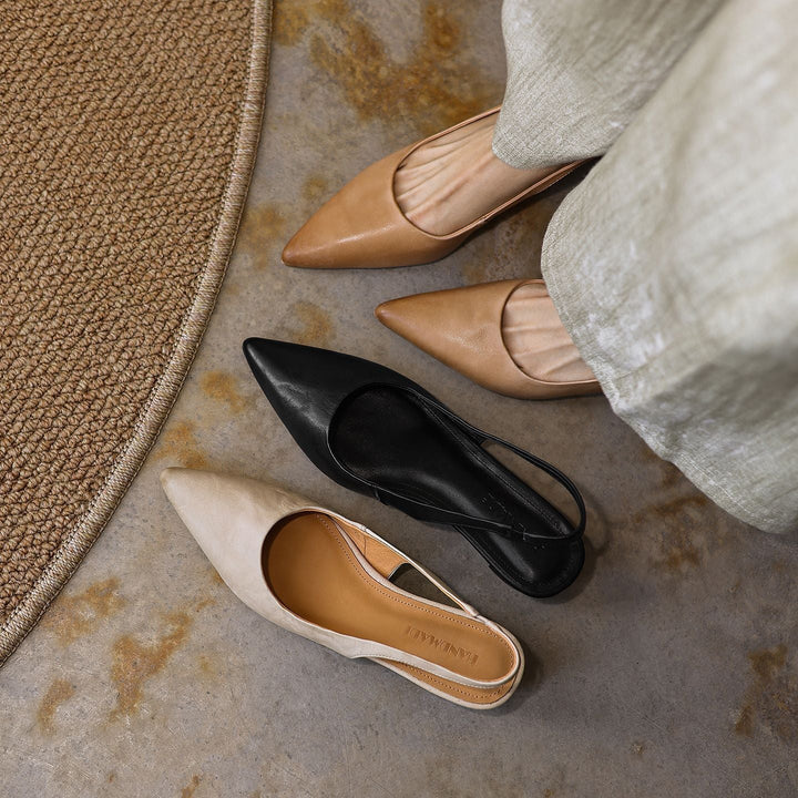 Women's sculpted leather slingback heels shown as a pair