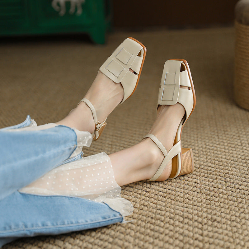 Close-up of heel on Audrey cutout leather heels