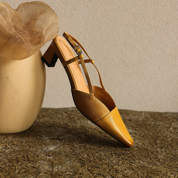 Top-down view of a pointed-toe leather slingback pump