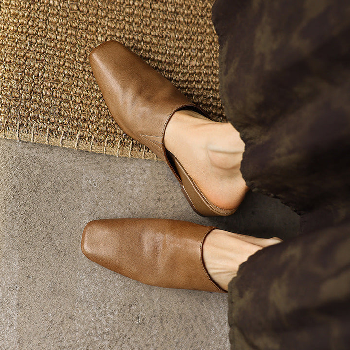 Leather wedge mule, back view showing the 2.25-inch wedge