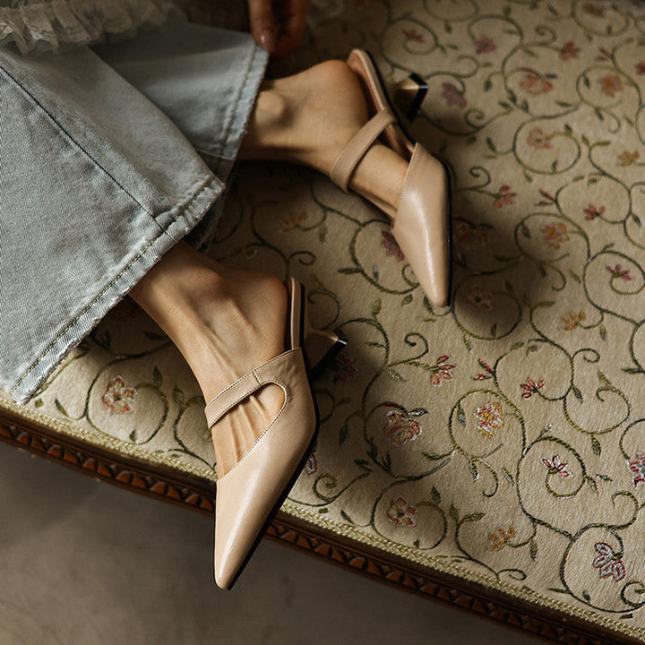 Sabine pointed mules worn with tailored trousers