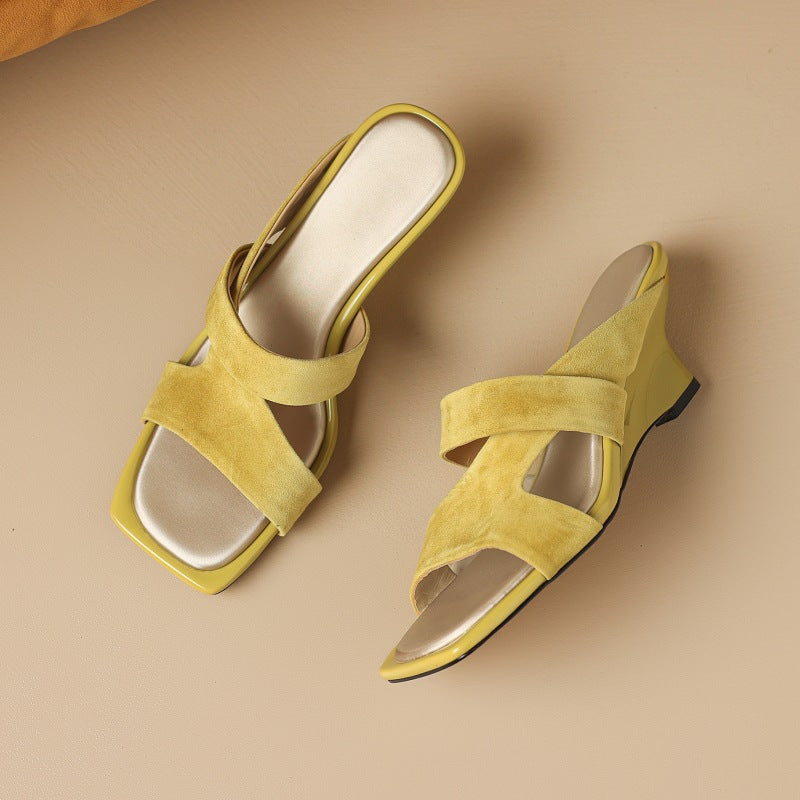 Square-toe suede wedge mules, top view of Soft Citron pair