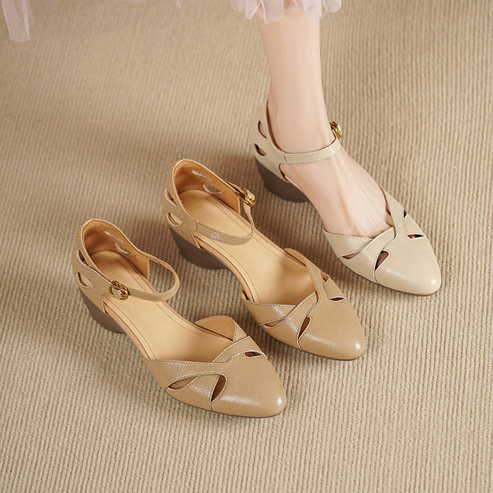 Cutwork leather ankle-strap heels, top view of Oat Ivory pair