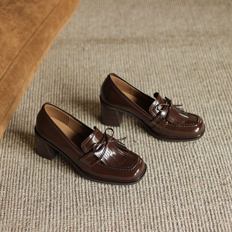 Fringe leather loafer pumps, top view of Espresso Brown pair