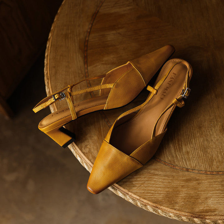Women's leather slingback pumps shown as a pair