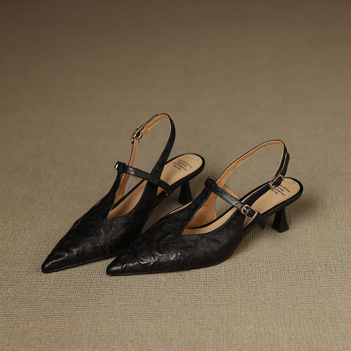 Pointed T-bar slingback heels, top view of Noir Black pair