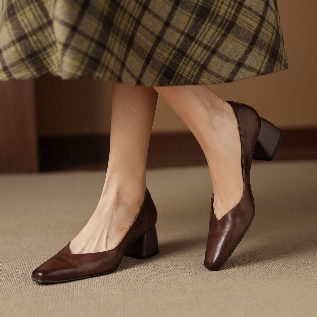 Sculpted square-toe detail of a leather pump