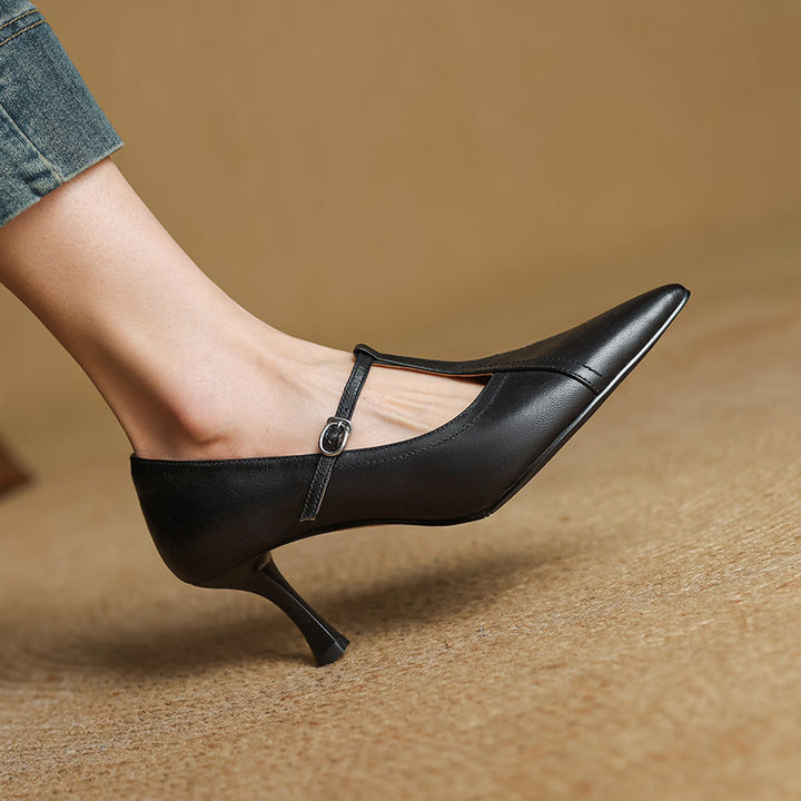 Close-up of heel on Evelyn leather T-strap pumps