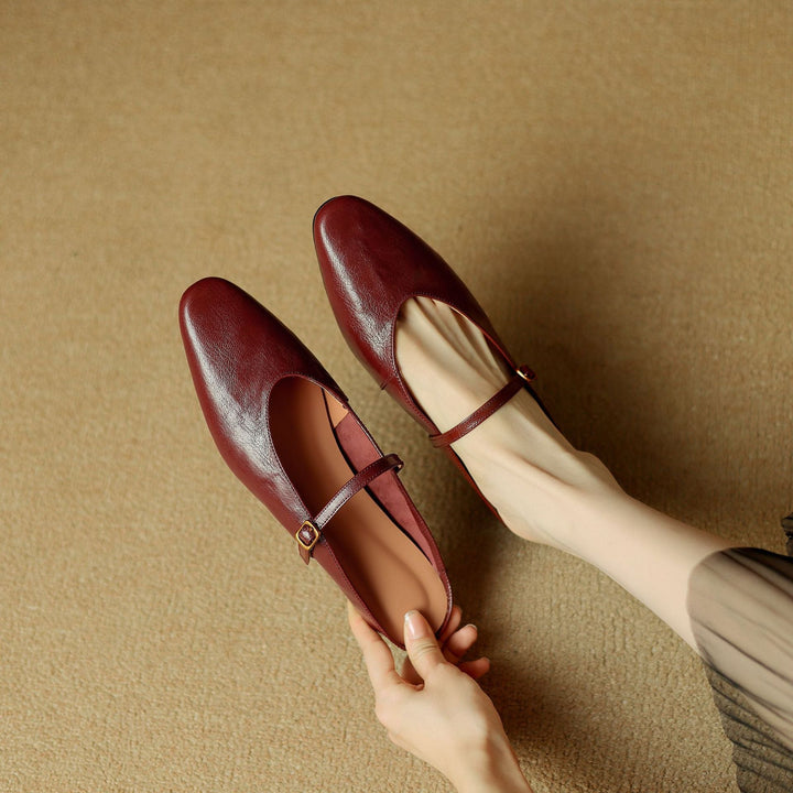 Close-up of soft lambskin leather and strap on a flat mule