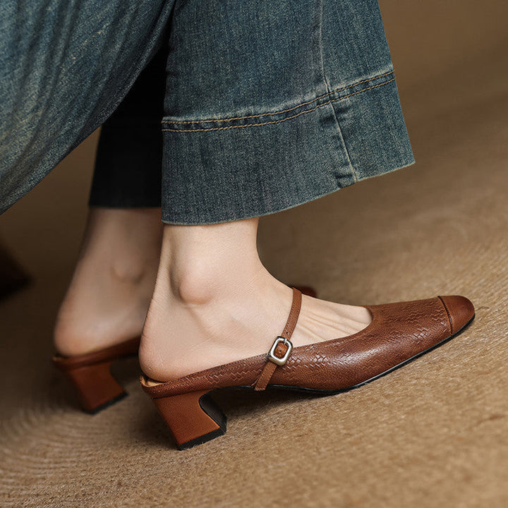 Cecilia heeled mules, detail of slim buckle strap
