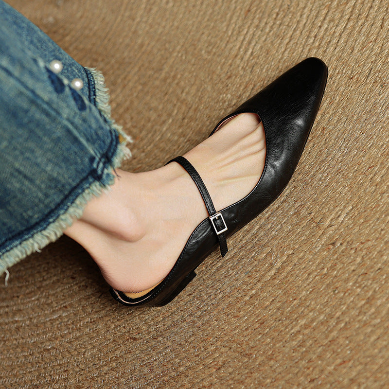 Rosalyn flat mules worn with cropped trousers