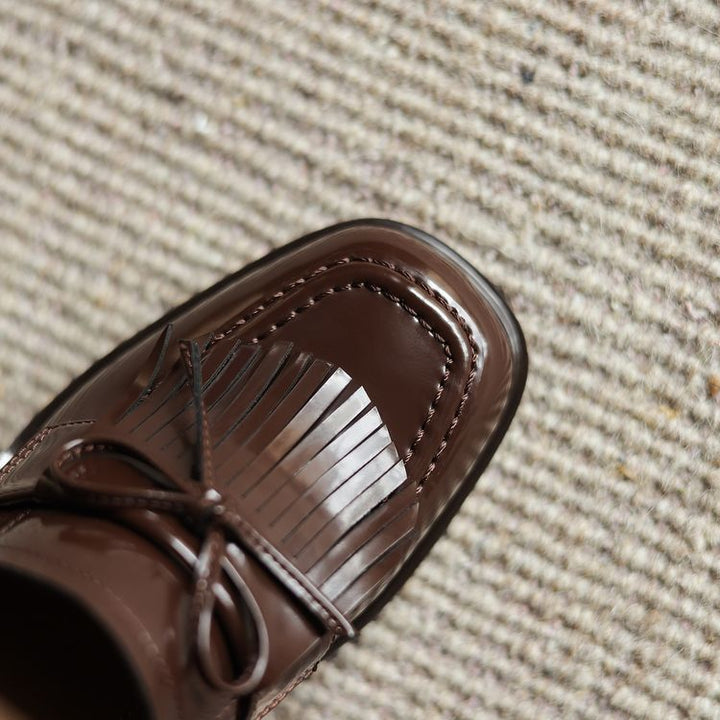 Tabitha fringe leather loafer pumps, both colors side by side