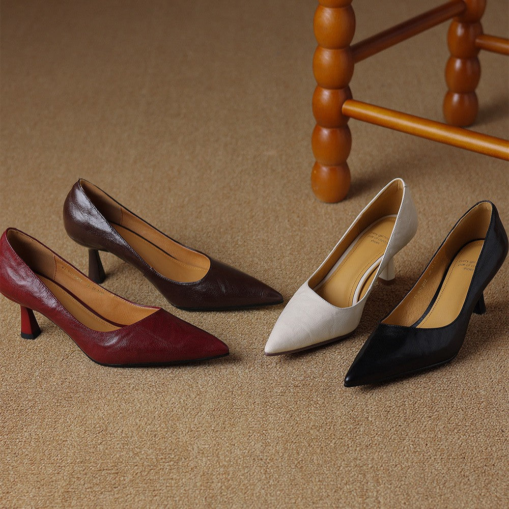 Espresso Brown lambskin pumps, angled studio shot