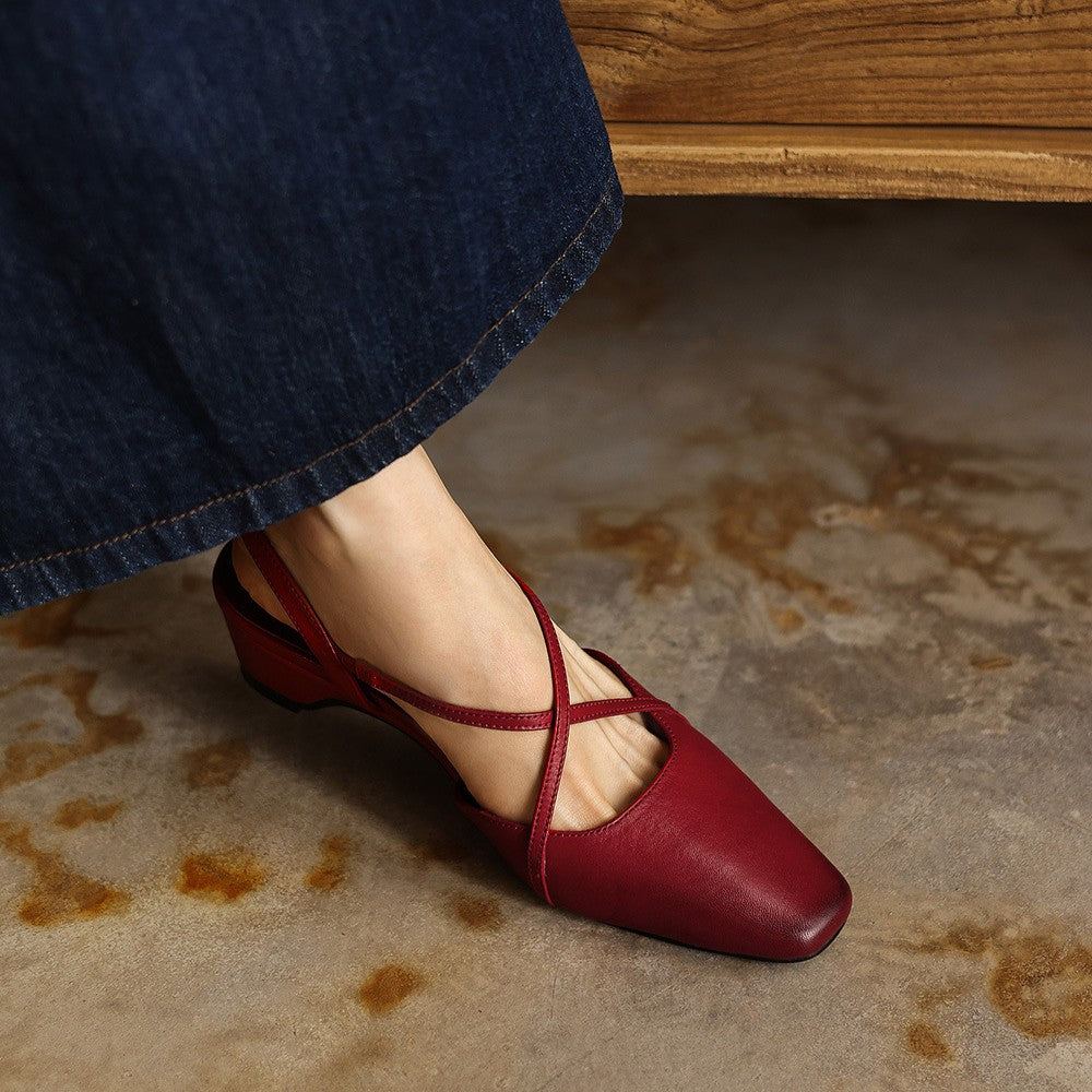 Close-up of cowhide leather and cross straps on a slingback heel