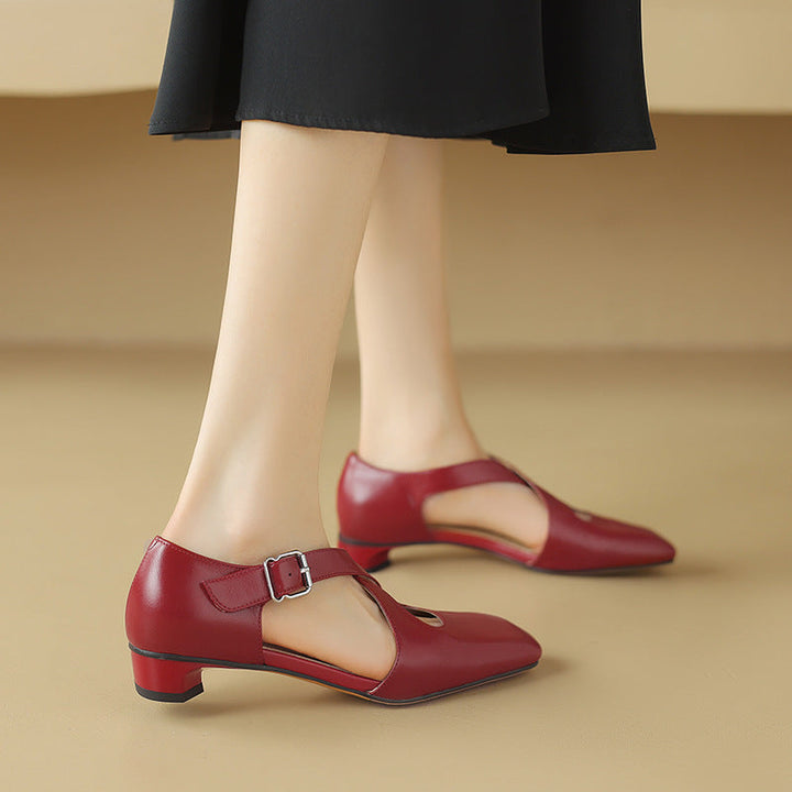 Soft Oat leather d'Orsay heel, side view of low block heel