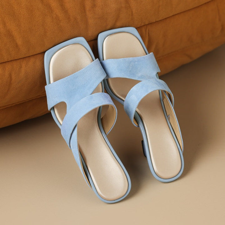 Marguerite square-toe suede wedge mules, both colors side by side