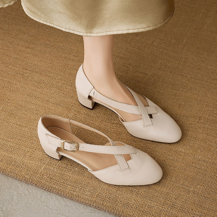 Close-up of block heel on Carol leather heels