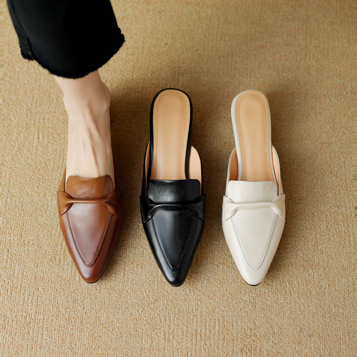 Pointed leather mule, angled block-heel view