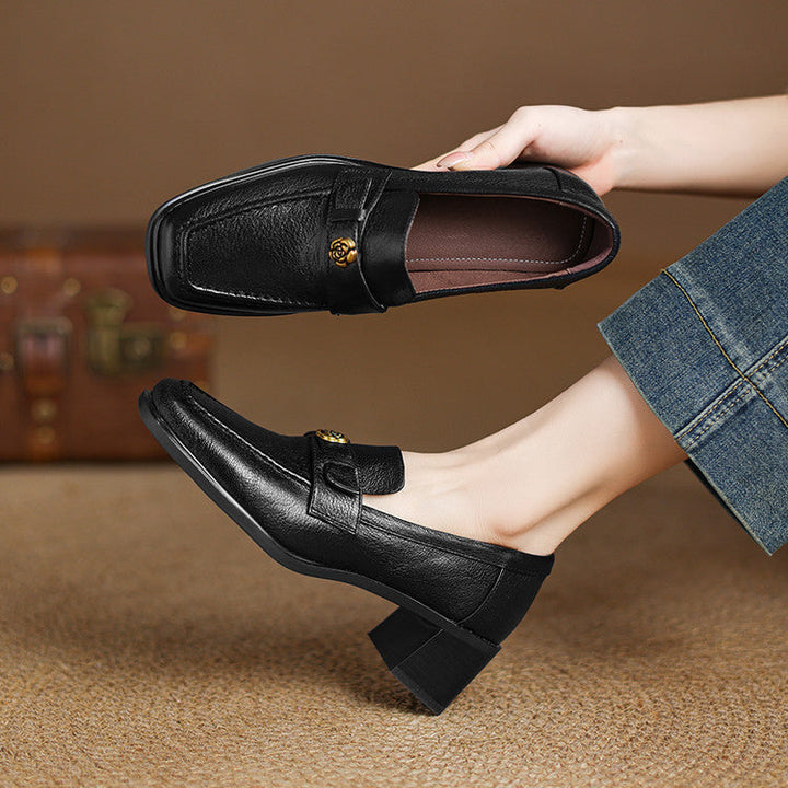 Sylvie loafer pumps worn with tailored trousers