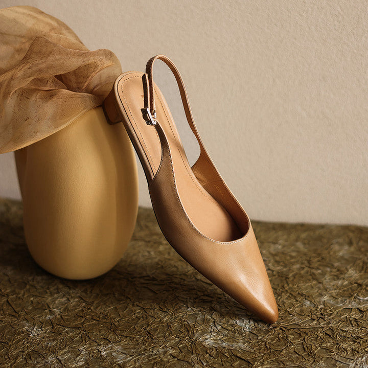 Top-down view of a pointed-toe leather slingback