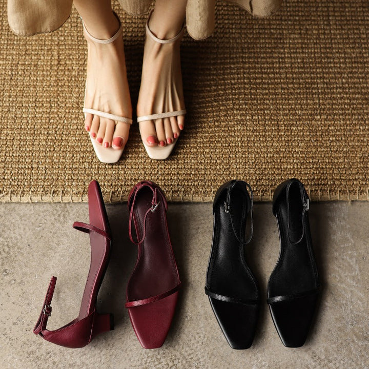 Classic Black leather sandal heels, angled studio shot