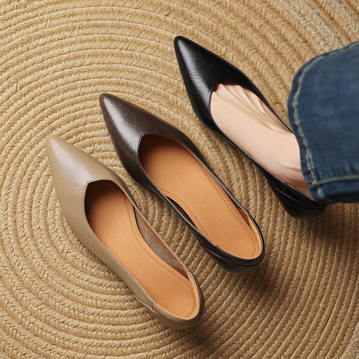 Top-down view of a pointed-toe sculpted leather pump